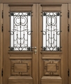 Металлическая парадная термодверь с ковкой, стеклом и массивом дерева